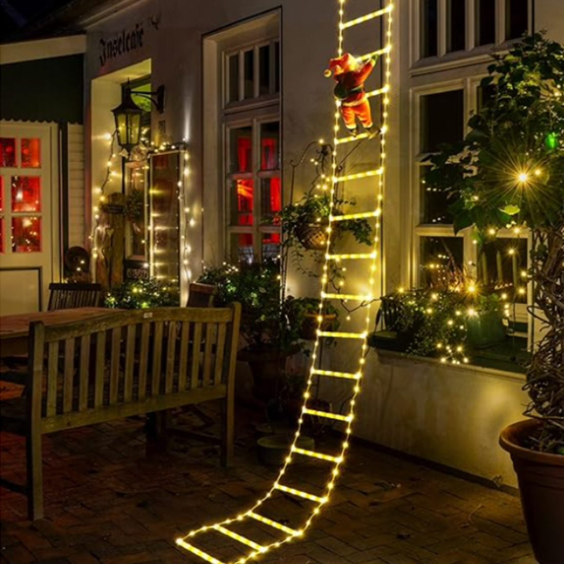 Luces LED de escalera con imagen de Papá Noel trepando